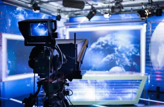 Broadcast camera set up to film
